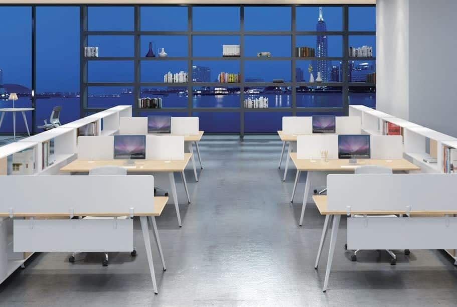 Two rows of the Sunline SP Desking systems in a high tech office looking at New York City